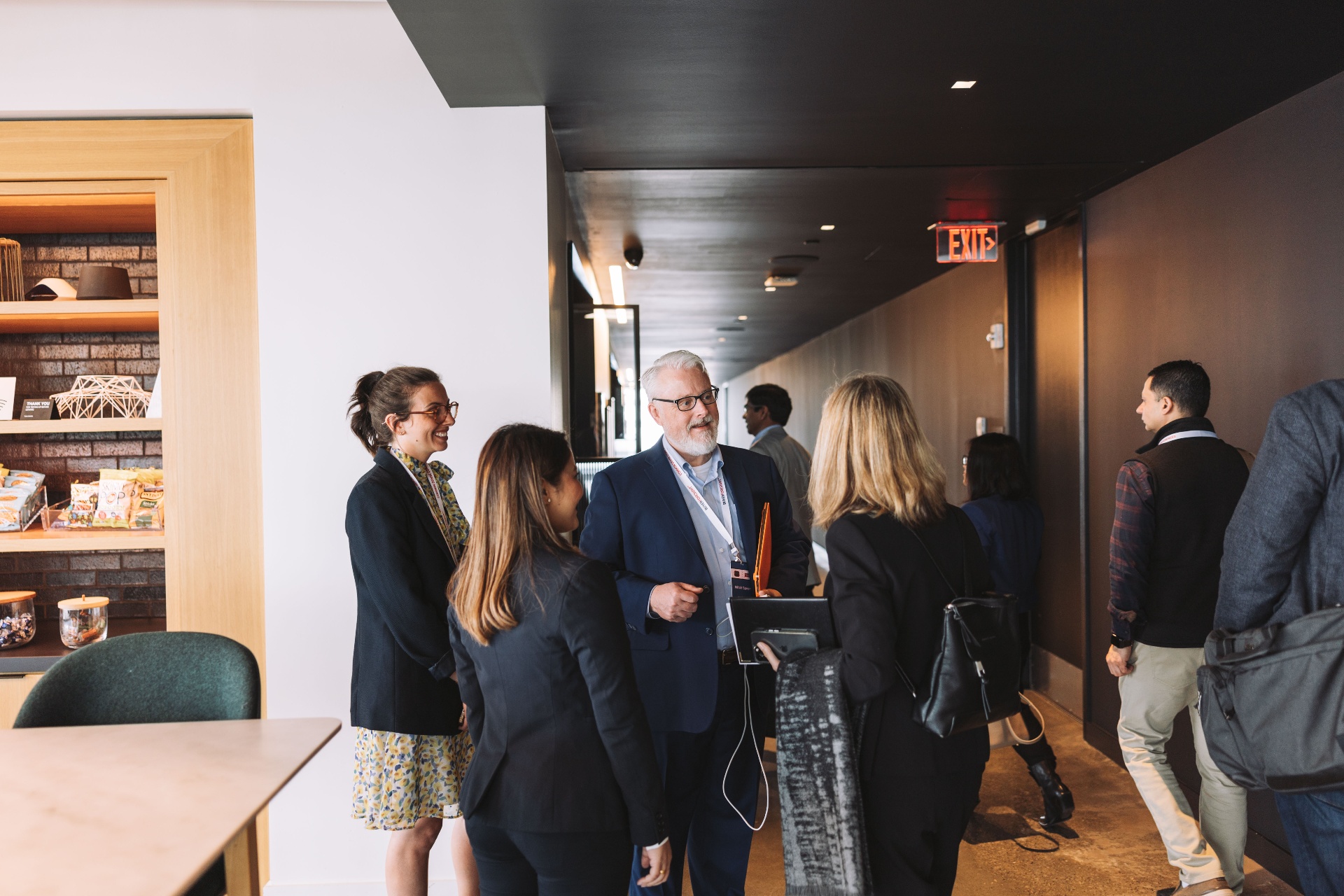 B2B tech event attendees engaging in conversation